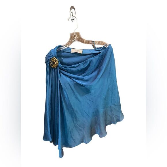 Badgley Mischka Tops - Silky Badgley Mischka capelet top blue with emblem -missing one stone MED